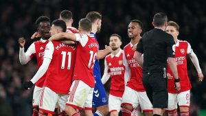 Arsenal players celebrating their goal against Everton
