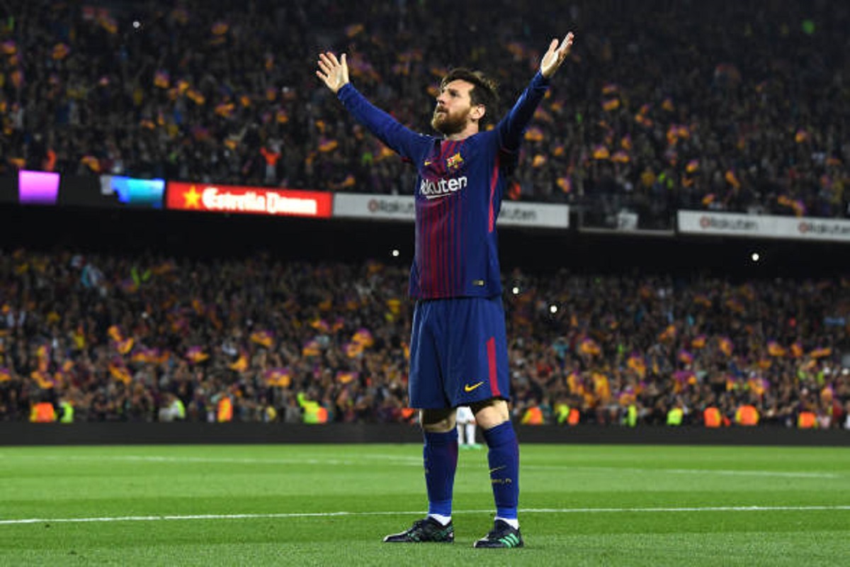 Messi standing of the pitch.