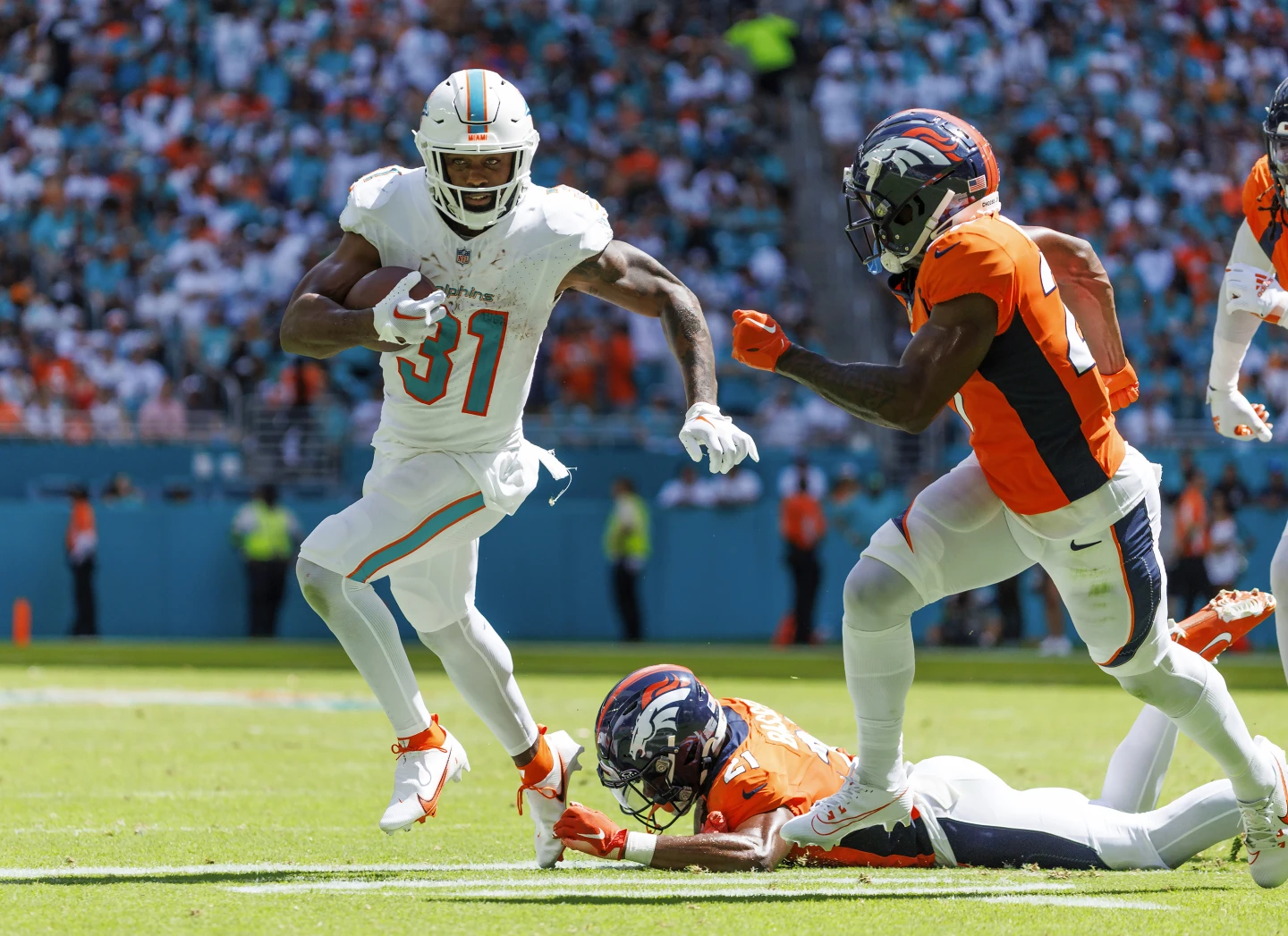 Dolphins Demolish Broncos 7020; Achieving Highest NFL Game Score in 57