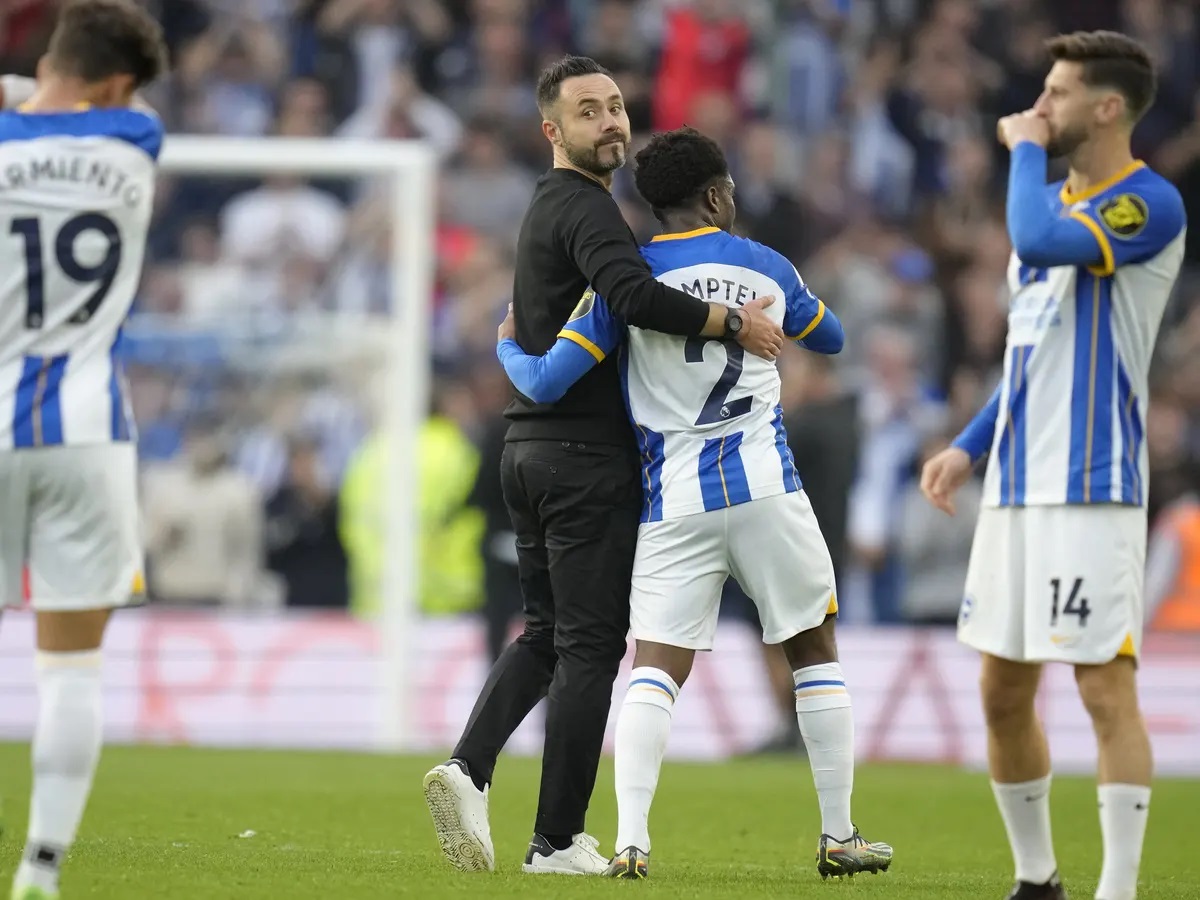 Roberto De Zerbi on field with Brighton FC