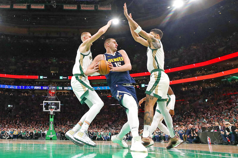 Nikola Jokic Wows NBA Fans in Clash with Tatum, Ending Celtics' Winning Streak
