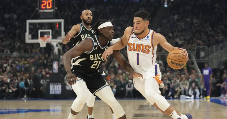 Report: Suns’ Devin Booker, Celtics’ Jrue Holiday Join LeBron, Curry as Team USA Core