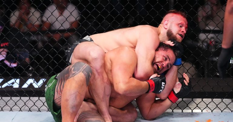 Marcin Tybura survives early onslaught, chokes out Tai Tuivasa in UFC Vegas 88 main event