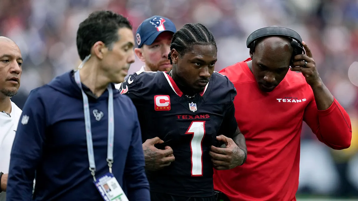 Texans' Stefon Diggs Exits Game with Knee Injury, Adding Pressure on Houston's Depleted Receiving Corps