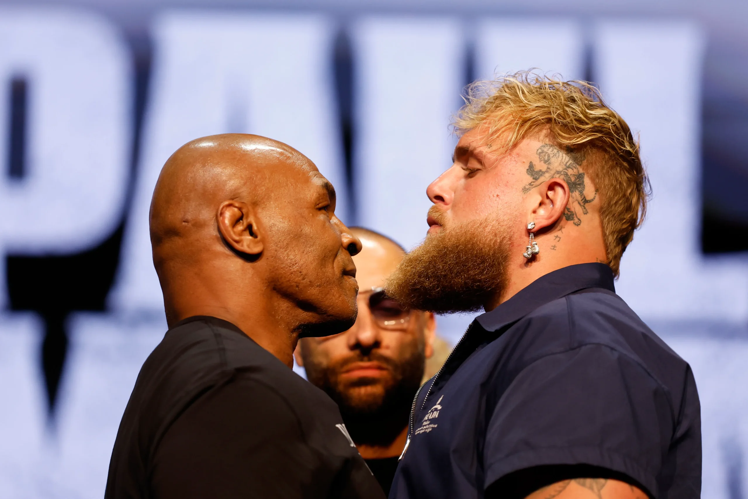 Mike Tyson Faces Jake Paul in Netflix's Live Event Amid Technical Glitches and Showmanship