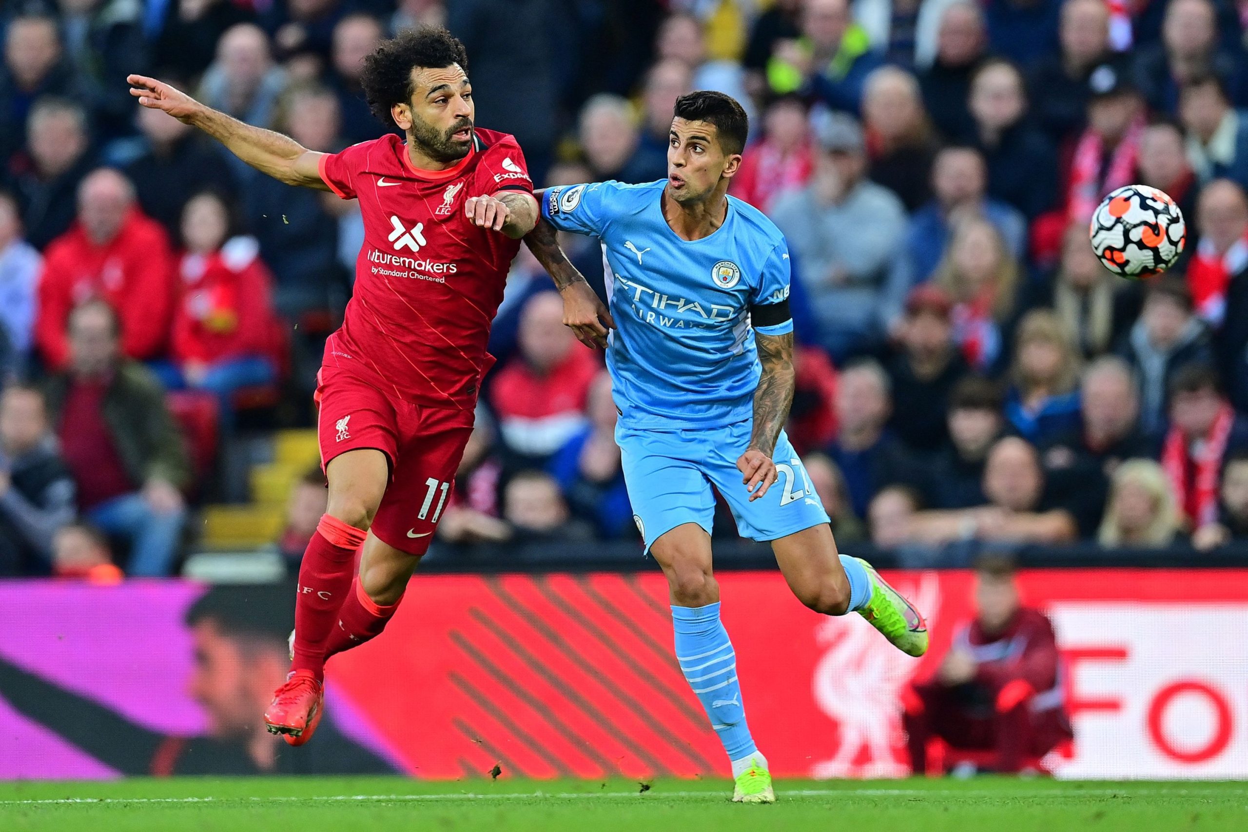 Liverpool and Manchester City Face Off in Crucial Premier League Clash with Title Implications