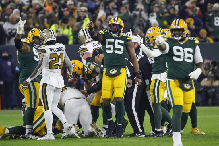 Packers Secure Playoff Spot with 34-0 Win Over Saints but Face Uncertainty After Watson Injury