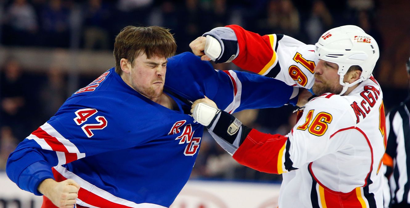 Should Fighting Be Banned in Hockey as Tradition Clashes With Player Safety in the NHL