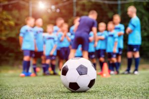 Why 'Playing Up' in Youth Sports Sparks Debate on Development and Long-Term Well-Being