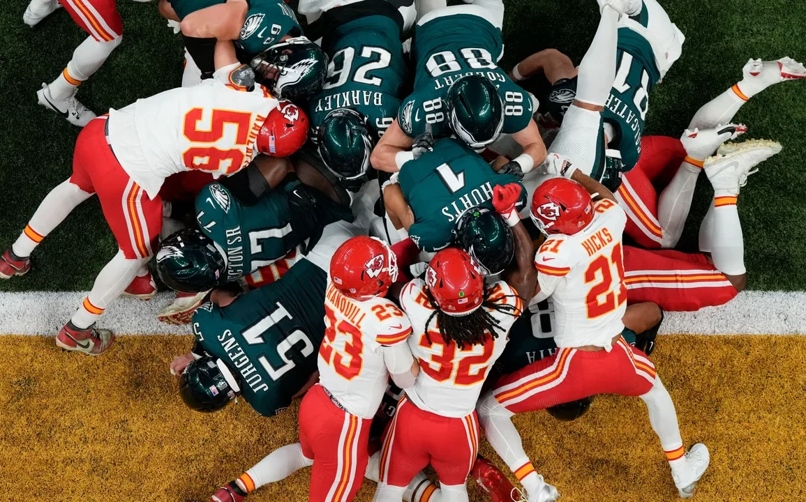 NFL Delays Decision on Tush Push Ban, Debate to Resume at May Meetings