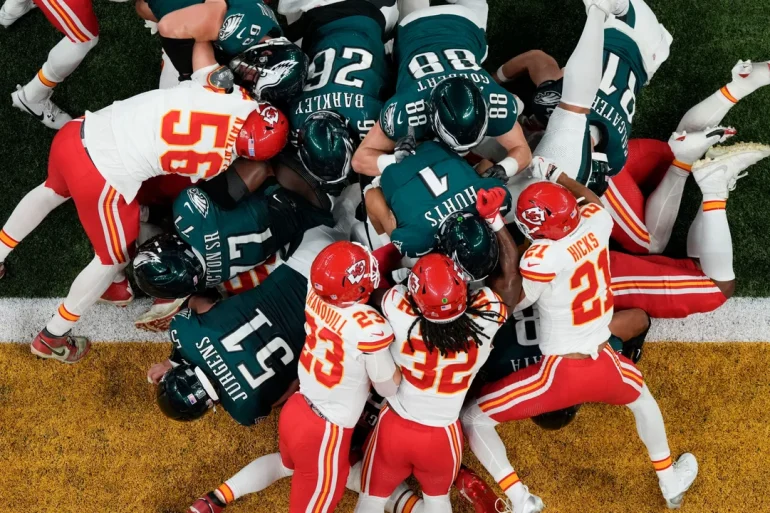 NFL Delays Decision on Tush Push Ban, Debate to Resume at May Meetings