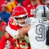 Maxx Crosby and Patrick Mahomes