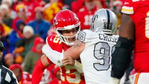 Maxx Crosby and Patrick Mahomes