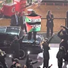 Performer Arrested After Super Bowl Protest with Flags, Banned for Life from NFL Events