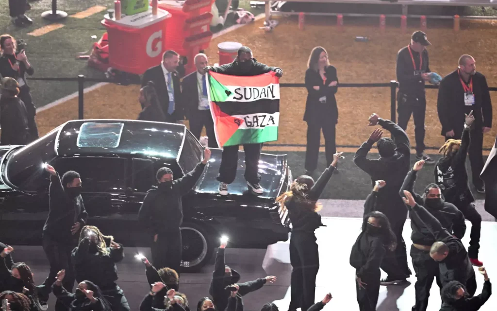 Performer Arrested After Super Bowl Protest with Flags, Banned for Life from NFL Events