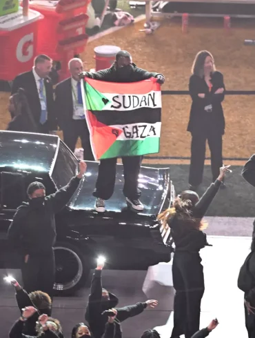 Performer Arrested After Super Bowl Protest with Flags, Banned for Life from NFL Events