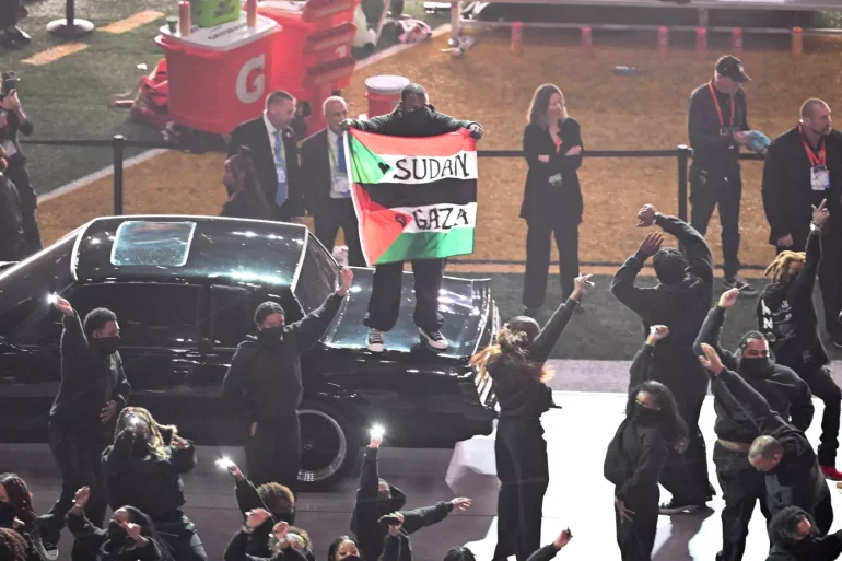 Performer Arrested After Super Bowl Protest with Flags, Banned for Life from NFL Events