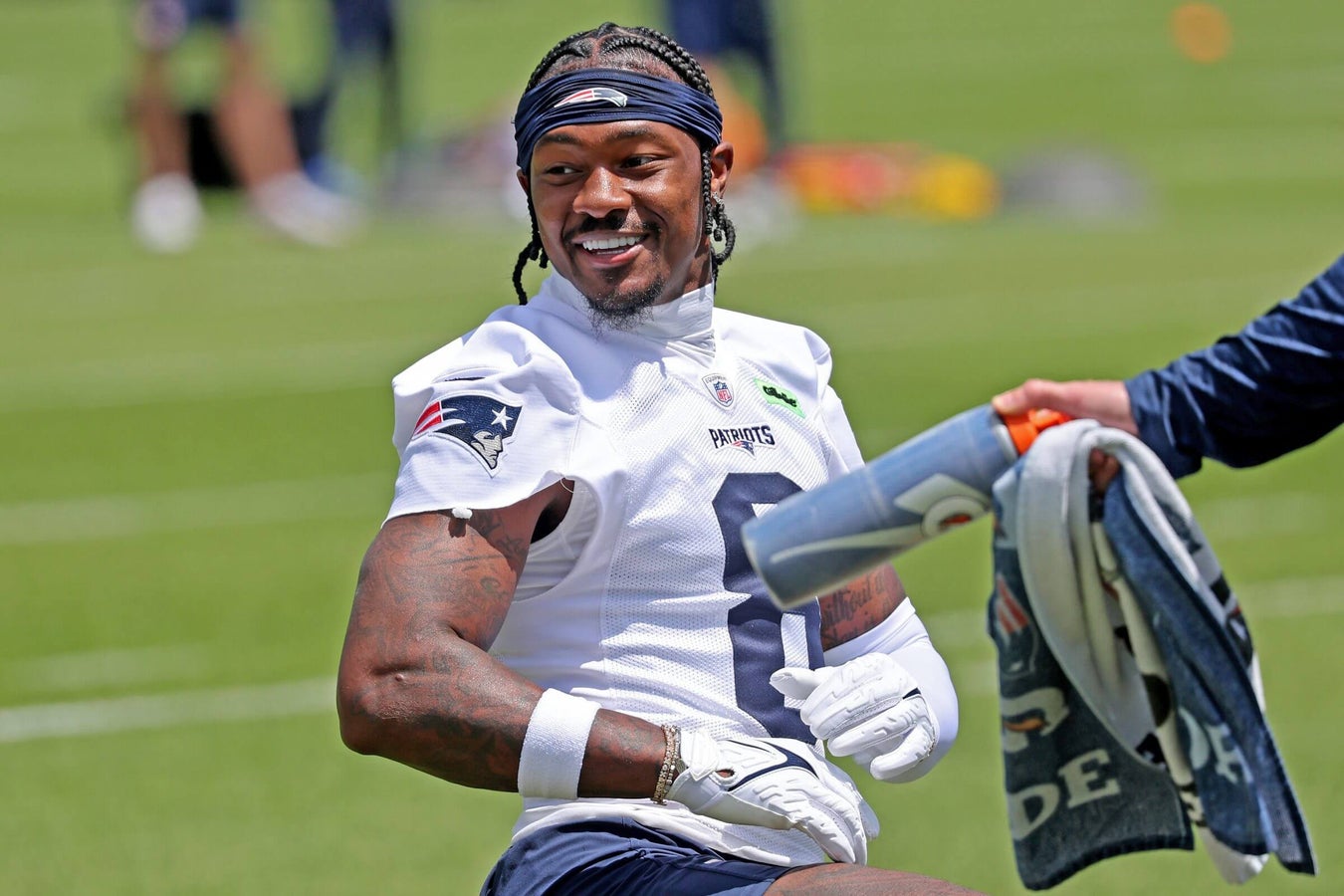 Stefon Diggs Returns to Patriots OTAs with Focus on Recovery and Offensive Fit