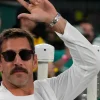Aaron Rodgers Refuses Fan's Autograph, Sparks Debate Over Memorabilia and Motives
