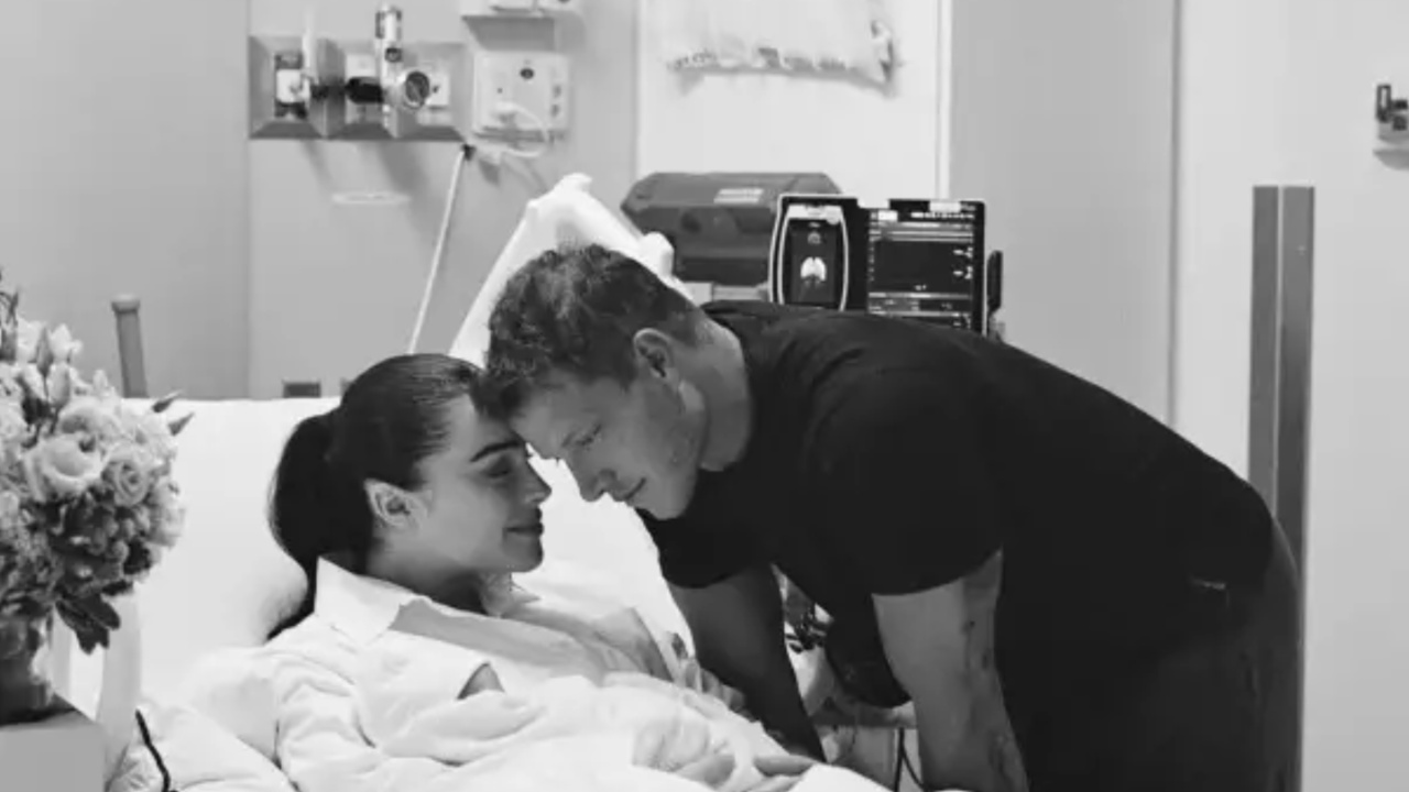Christian McCaffrey and Olivia Culpo 