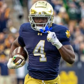 McShay Predicts Titans Will Choose EDGE Rusher Bain Over Running Back Love