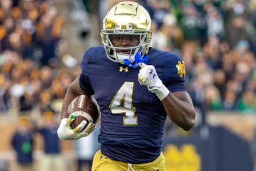 McShay Predicts Titans Will Choose EDGE Rusher Bain Over Running Back Love