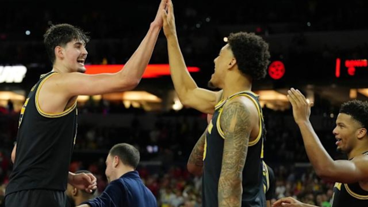 Michigan Wolverines Face Connecticut Huskies in Clash of Dominance and Championship Pedigree