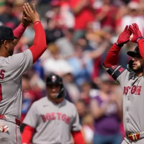 Reds Triumph Over Red Sox in 11 Innings Amid Umpiring Controversy and Drama