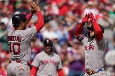 Reds Triumph Over Red Sox in 11 Innings Amid Umpiring Controversy and Drama