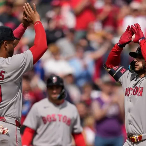 Reds Triumph Over Red Sox in 11 Innings Amid Umpiring Controversy and Drama