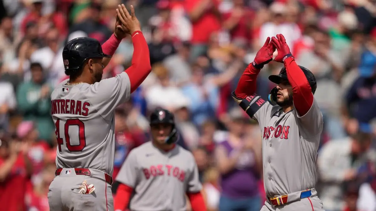 Reds Triumph Over Red Sox in 11 Innings Amid Umpiring Controversy and Drama